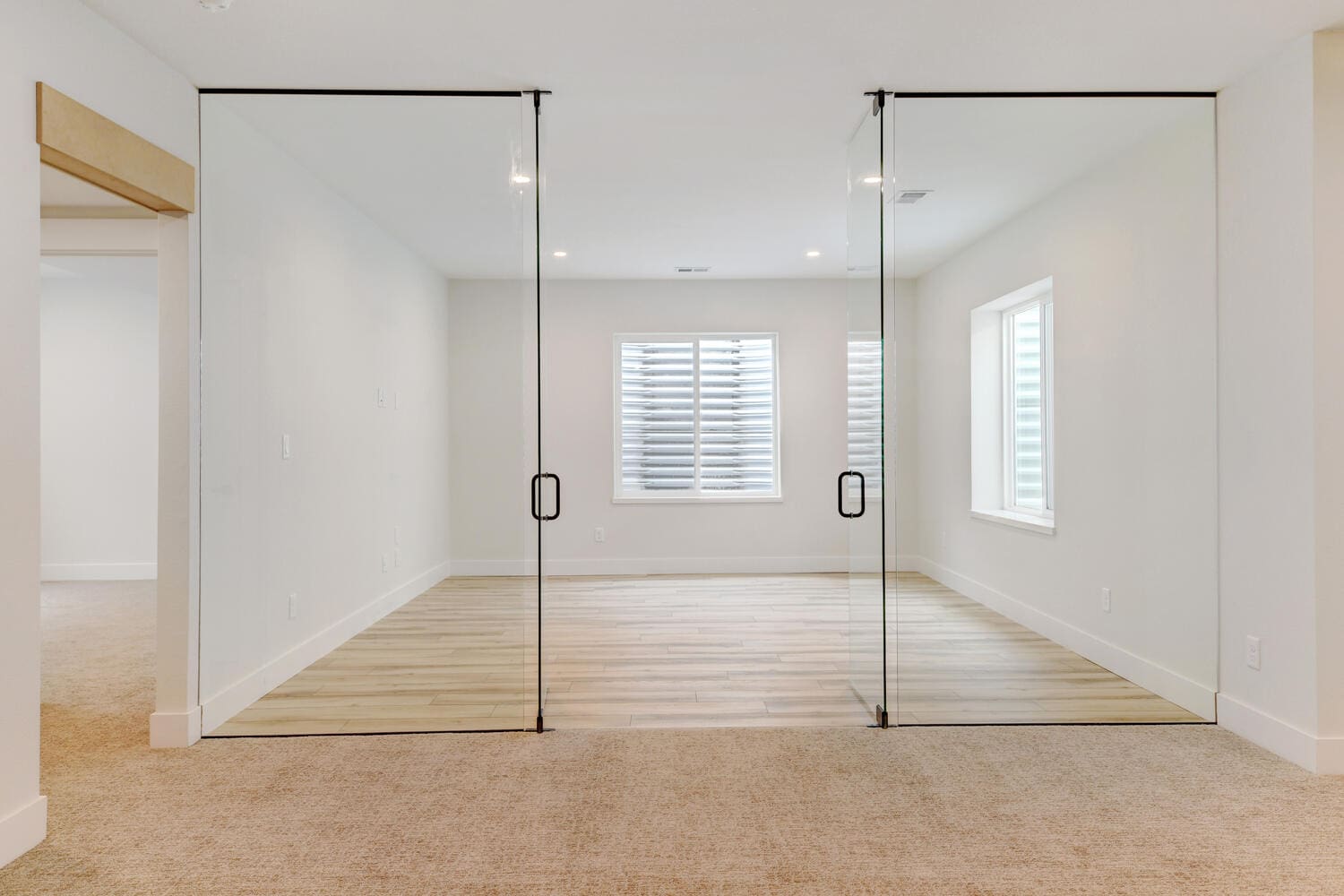 spacious room with glass doors