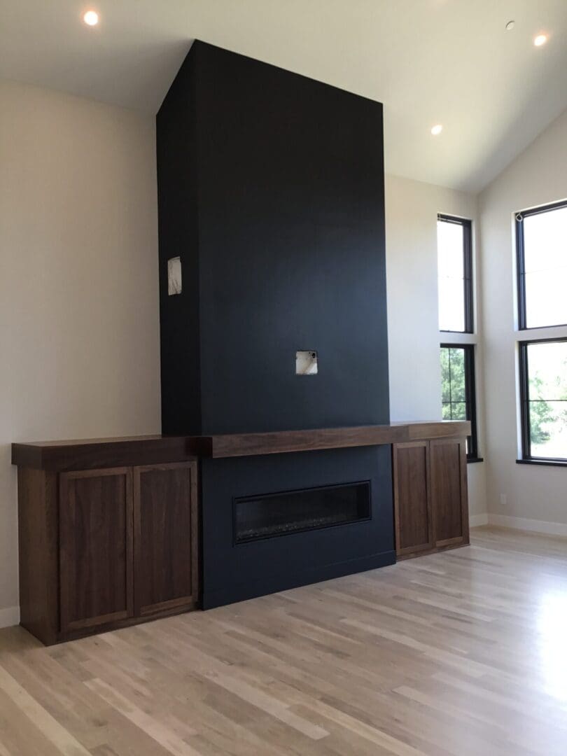 a fireplace in between two counters
